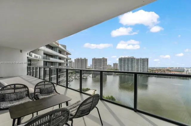 a bathroom with a sink mirror and shower