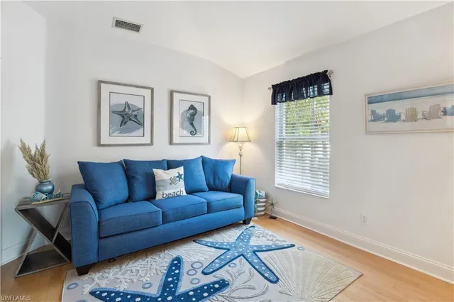 a view of a backyard with sitting area