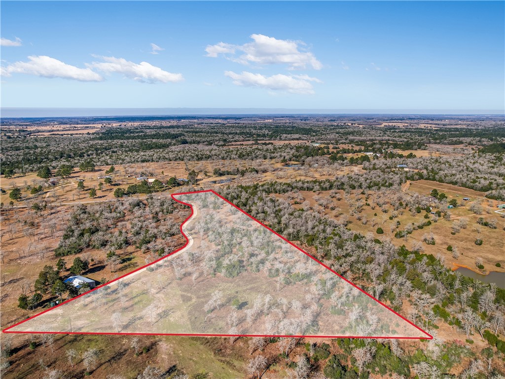 2 High Crossing Road Smithville, TX 78957 - Photo 1 of 1 Back of the property looking towards the road.
