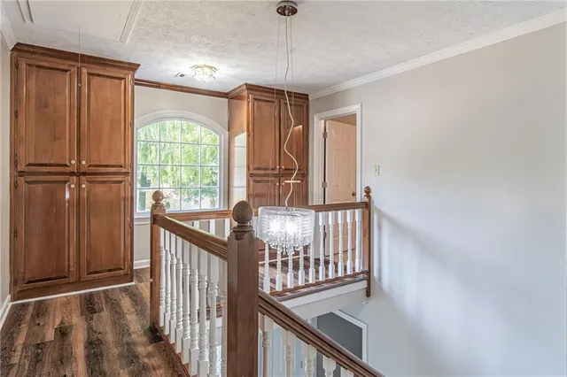 a view of entryway with wooden floor