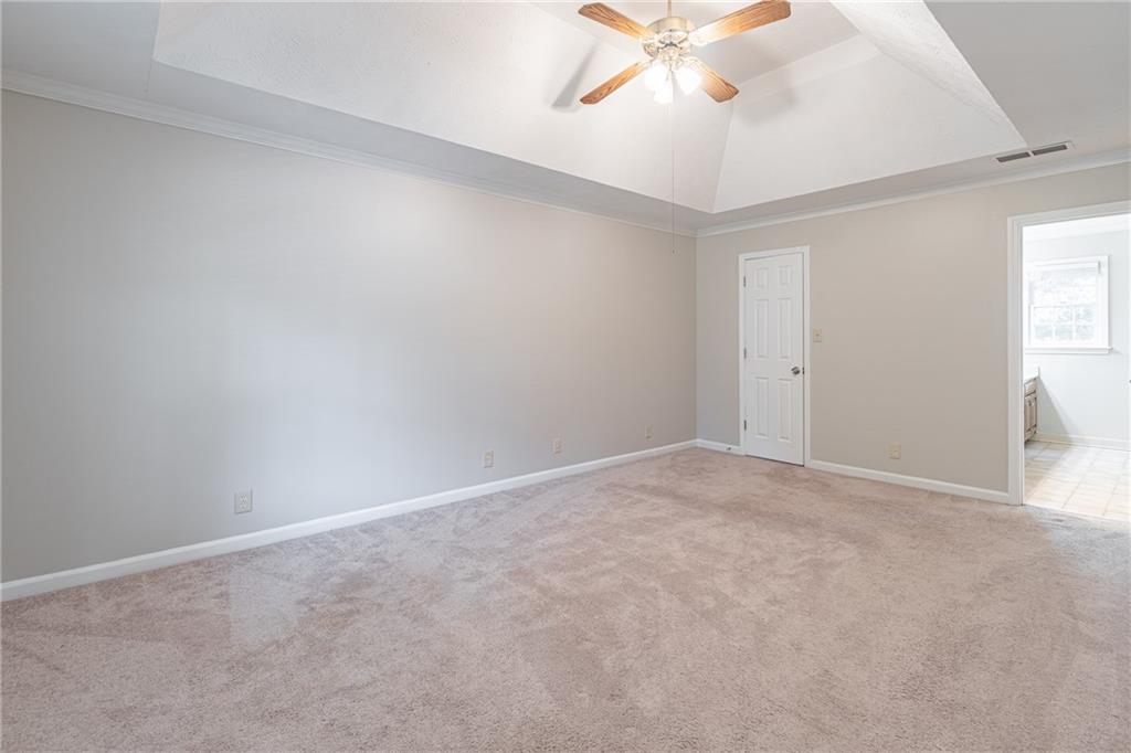 736 Singley Drive Lawrenceville, GA 30044 - Photo 13 of 33 a view of an empty room and chandelier fan