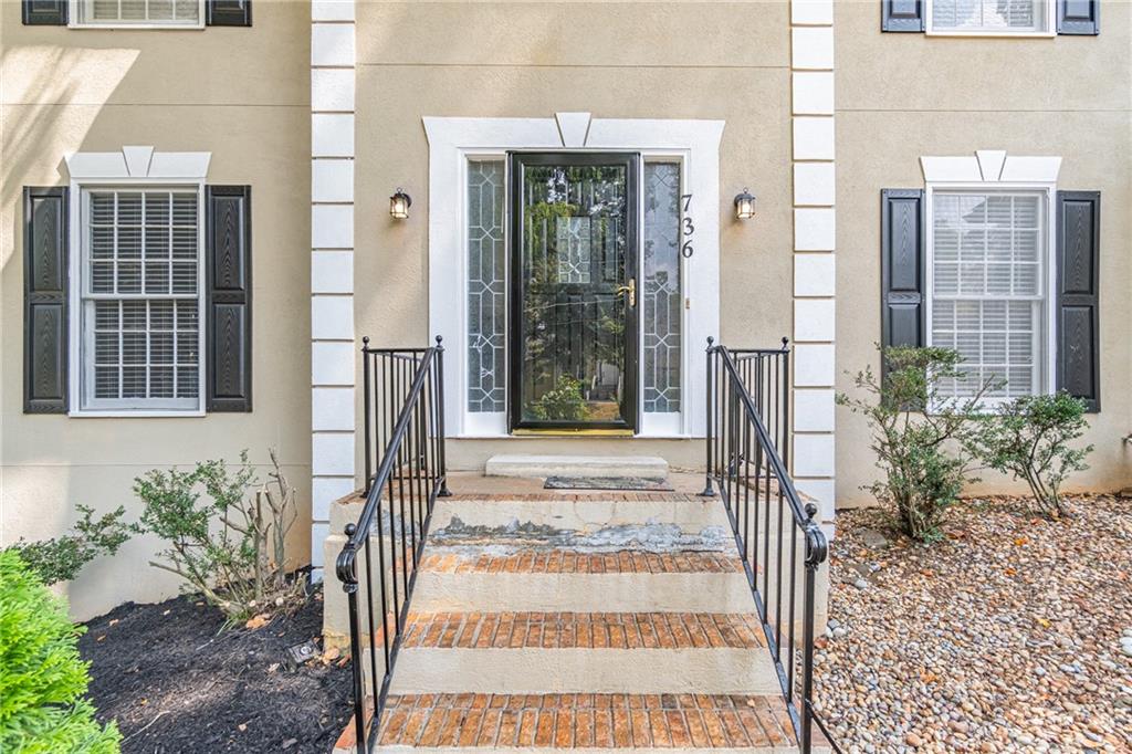 736 Singley Drive Lawrenceville, GA 30044 - Photo 2 of 33 a view of a entrance door of the house