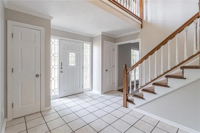 a view of an entryway with staircase