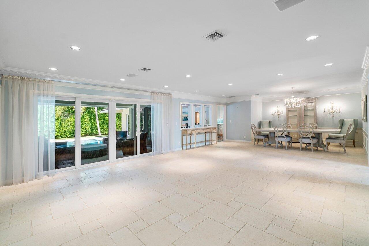 2377 East Silver Palm Road Boca Raton, FL 33432 - Photo 15 of 40 a view of a livingroom with furniture and floor to ceiling window