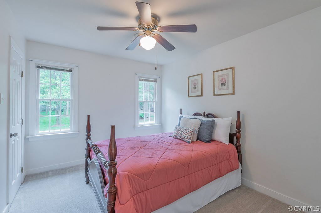 14202 Long Gate Road Midlothian, VA 23112 - Photo 15 of 27 a bedroom with a bed and a window
