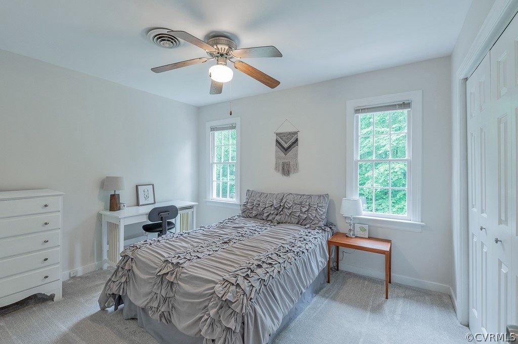 14202 Long Gate Road Midlothian, VA 23112 - Photo 17 of 27 a bedroom with a bed and a window