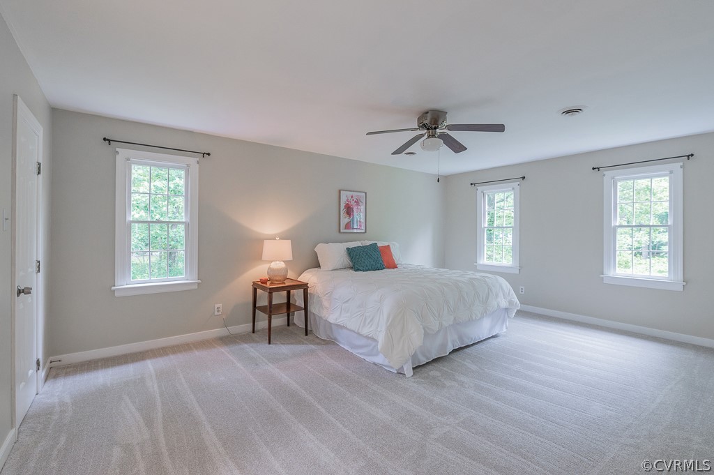 14202 Long Gate Road Midlothian, VA 23112 - Photo 20 of 27 a bedroom with a bed and a window