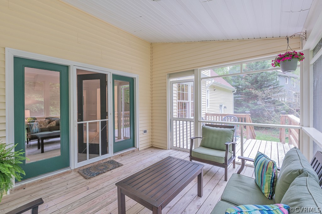 14202 Long Gate Road Midlothian, VA 23112 - Photo 23 of 27 a house with wooden floor and outdoor seating