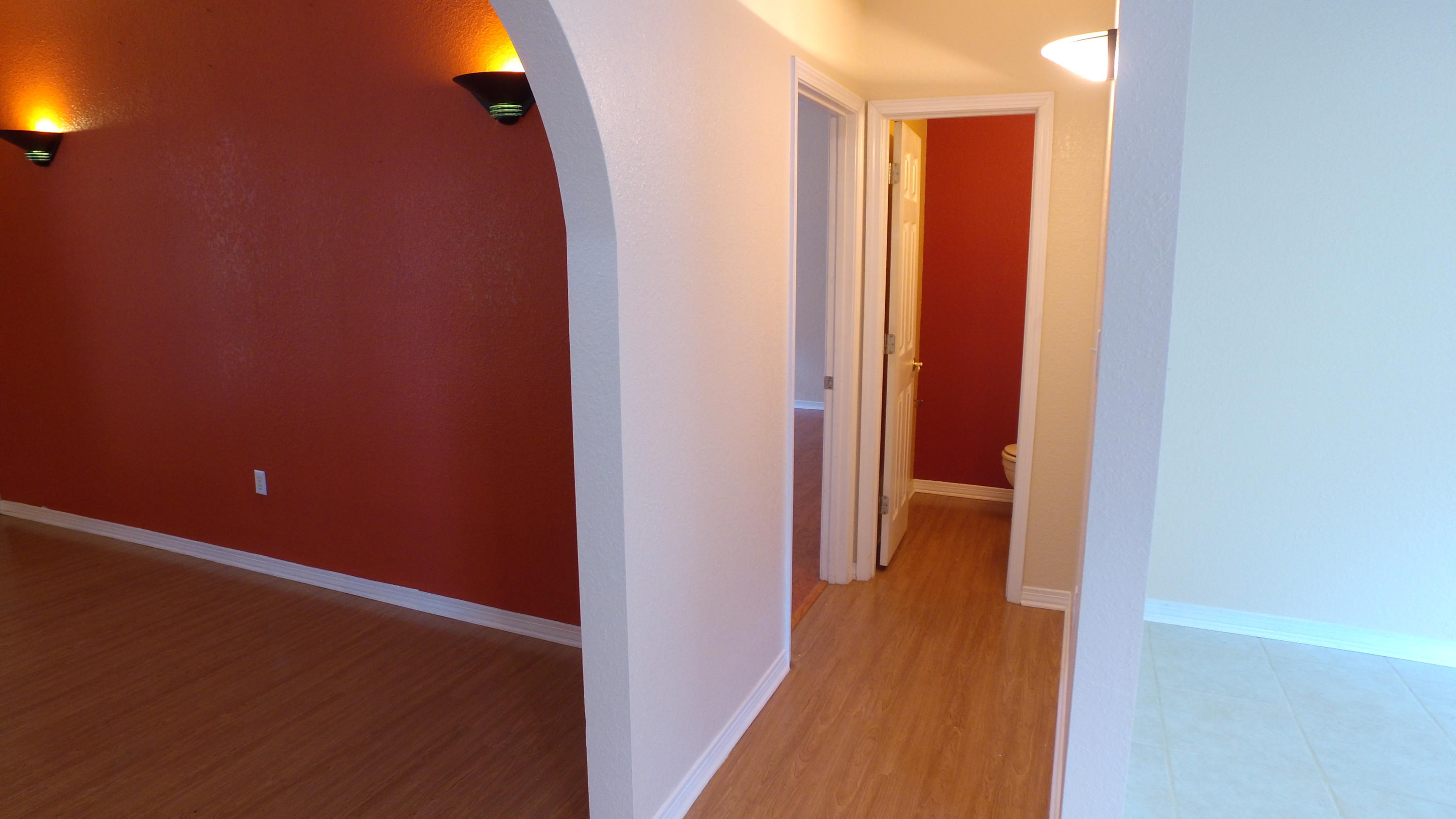 564 Ridge Lake Road Crestview, FL 32536 - Photo 28 of 58 a view of a hallway with wooden floor