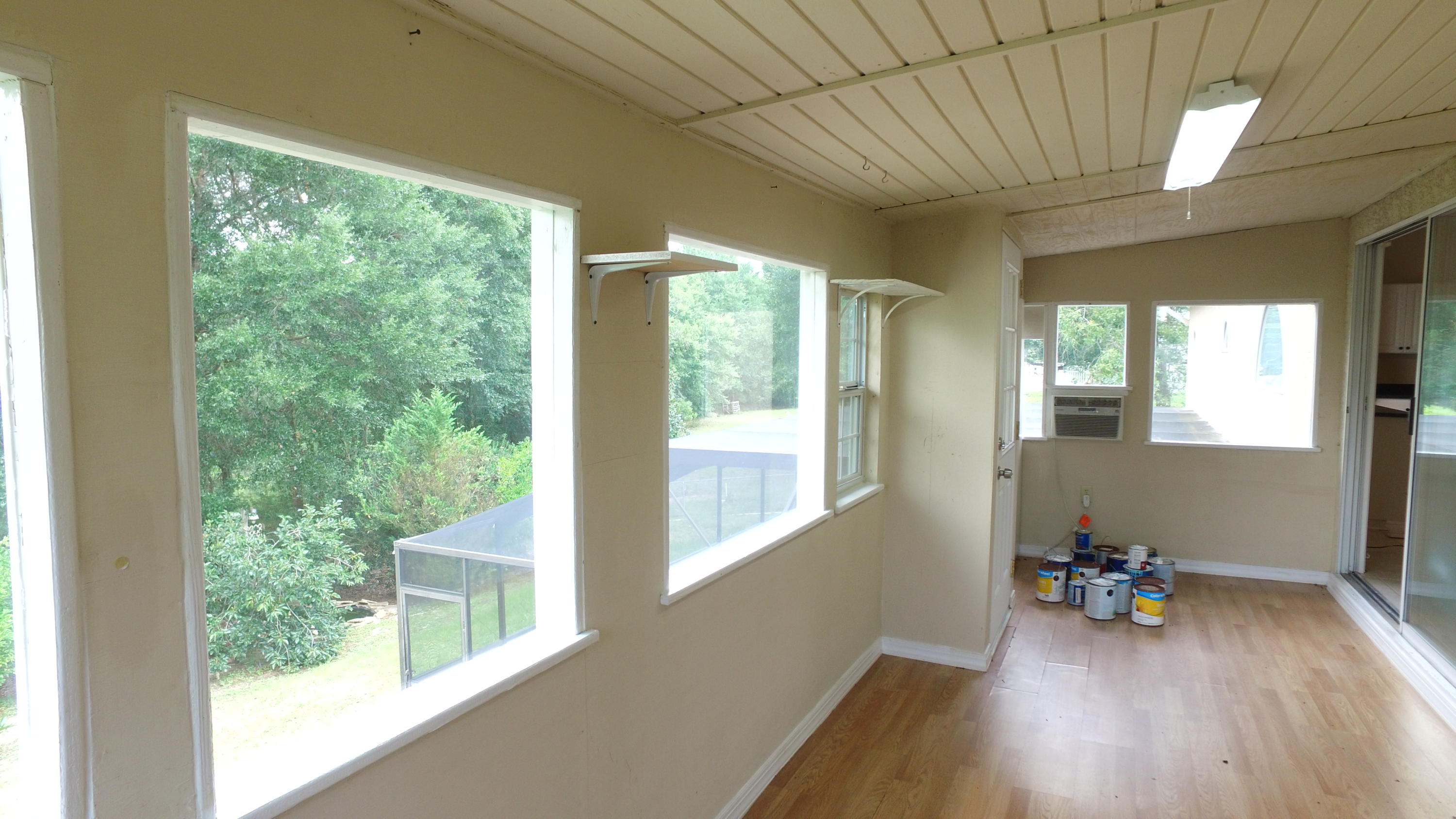 564 Ridge Lake Road Crestview, FL 32536 - Photo 37 of 58 a room with wooden floor and a window