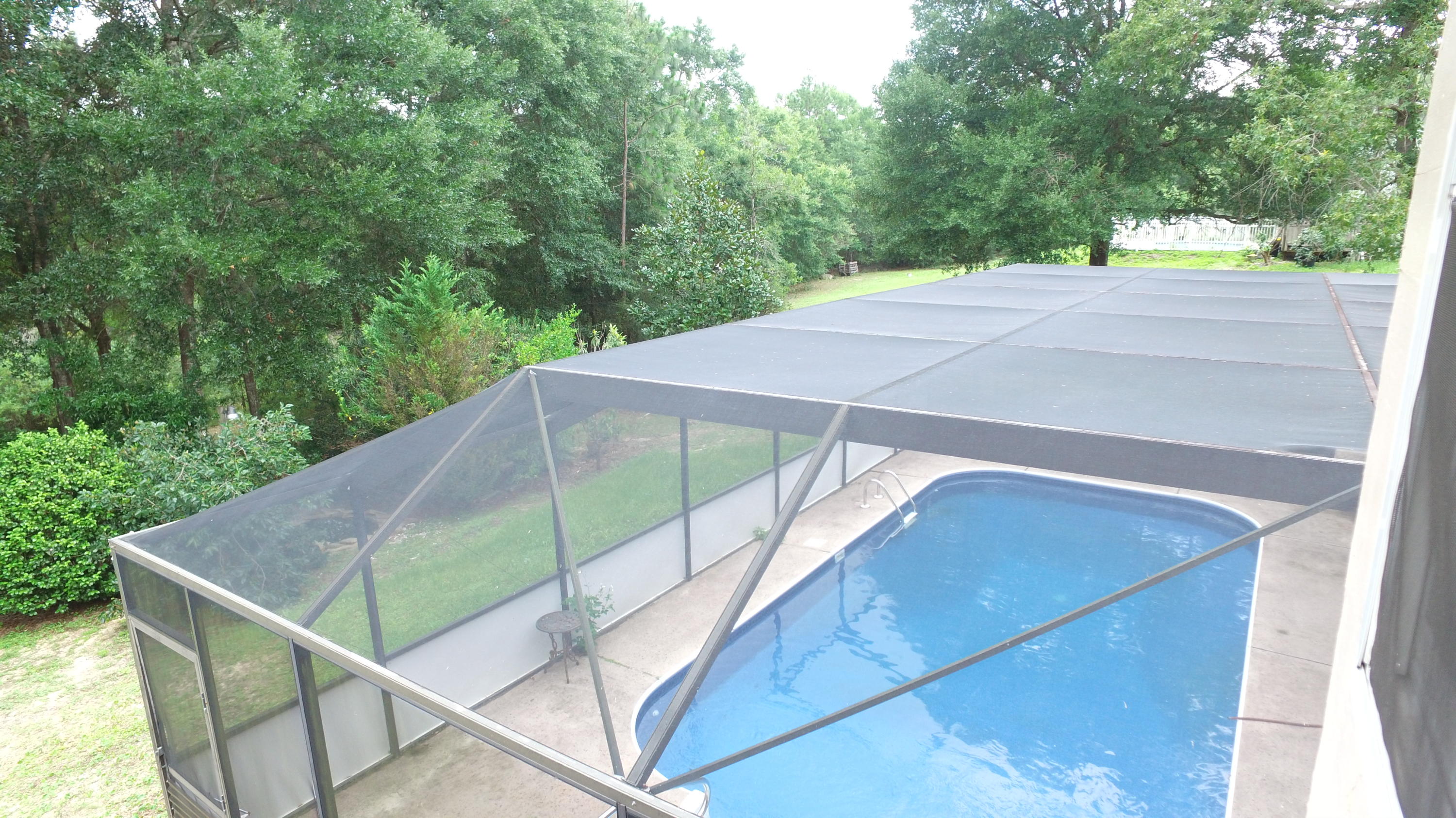 564 Ridge Lake Road Crestview, FL 32536 - Photo 39 of 58 a view of a balcony with yard