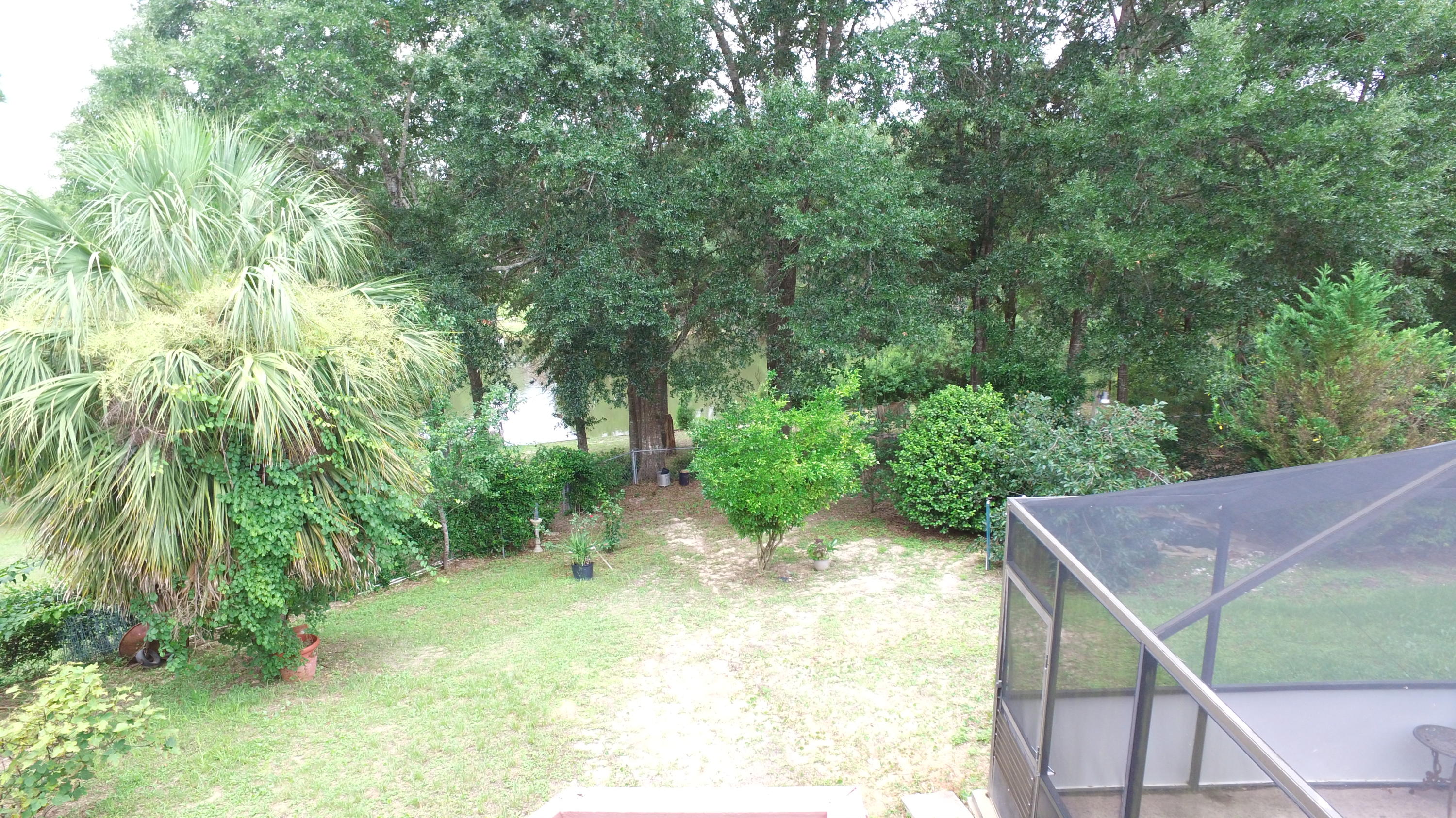 564 Ridge Lake Road Crestview, FL 32536 - Photo 40 of 58 a view of yard from a balcony