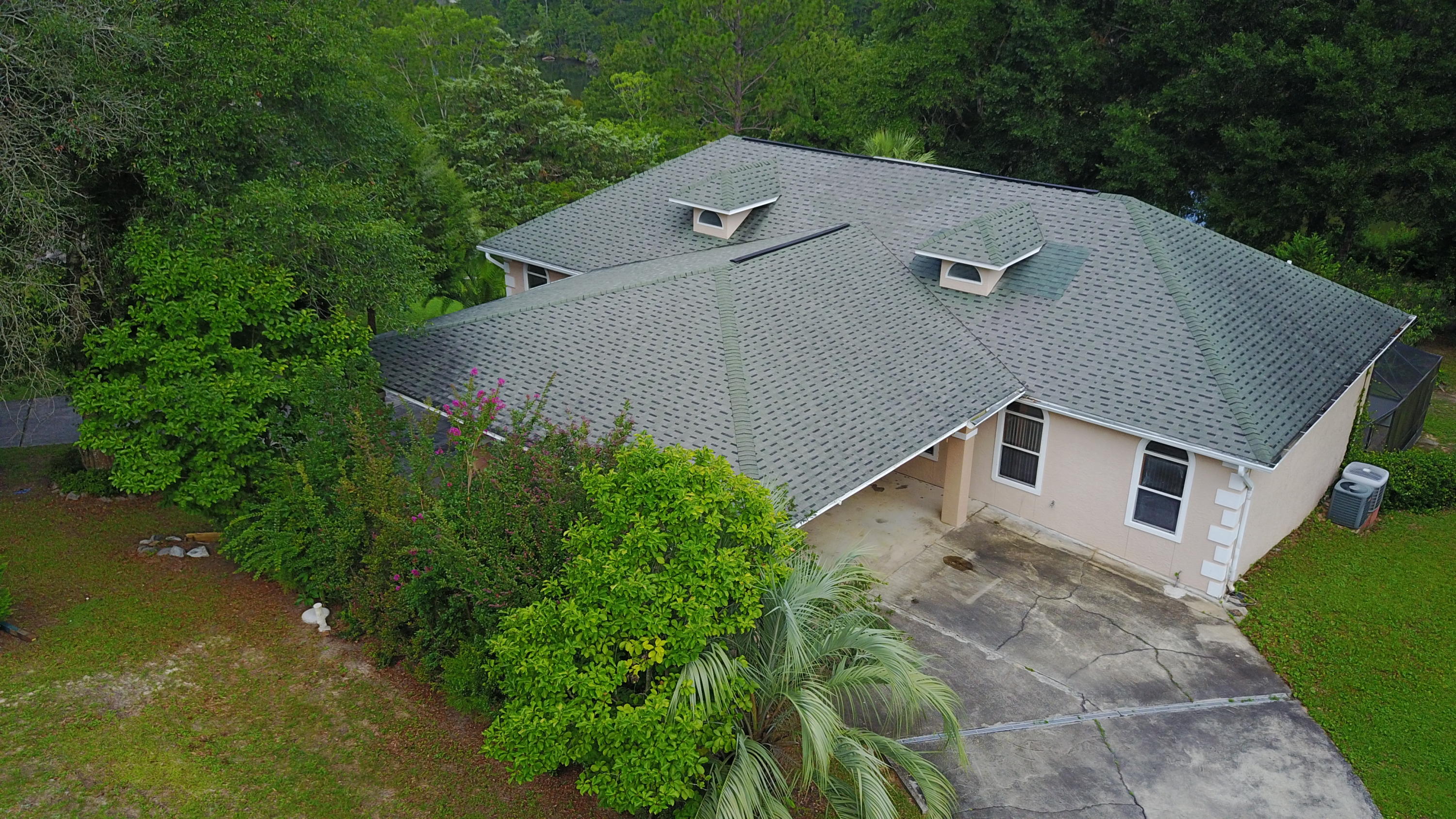 564 Ridge Lake Road Crestview, FL 32536 - Photo 4 of 58 an aerial view of a house with a yard and trees all around
