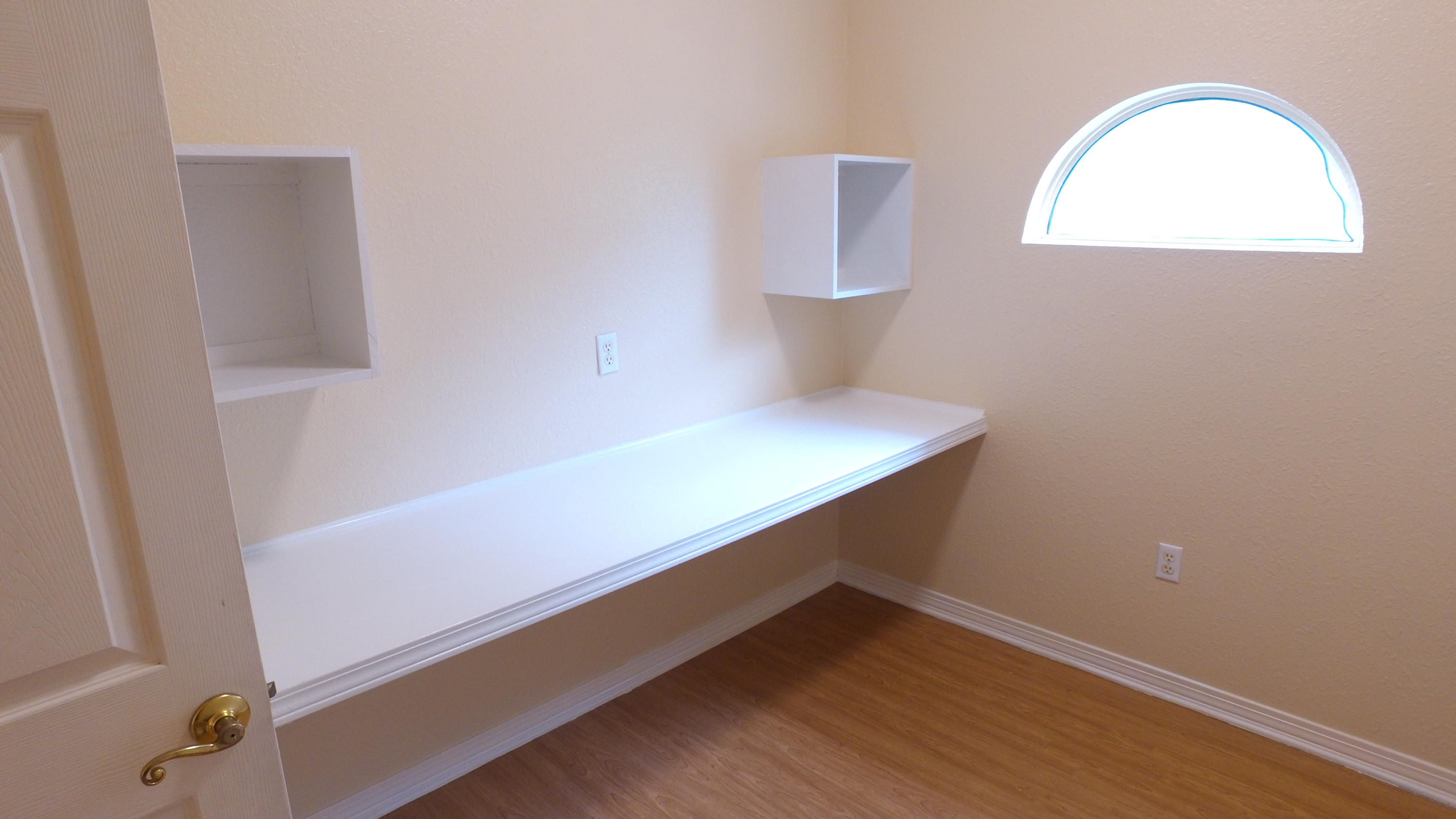 564 Ridge Lake Road Crestview, FL 32536 - Photo 42 of 58 a room with storage and window