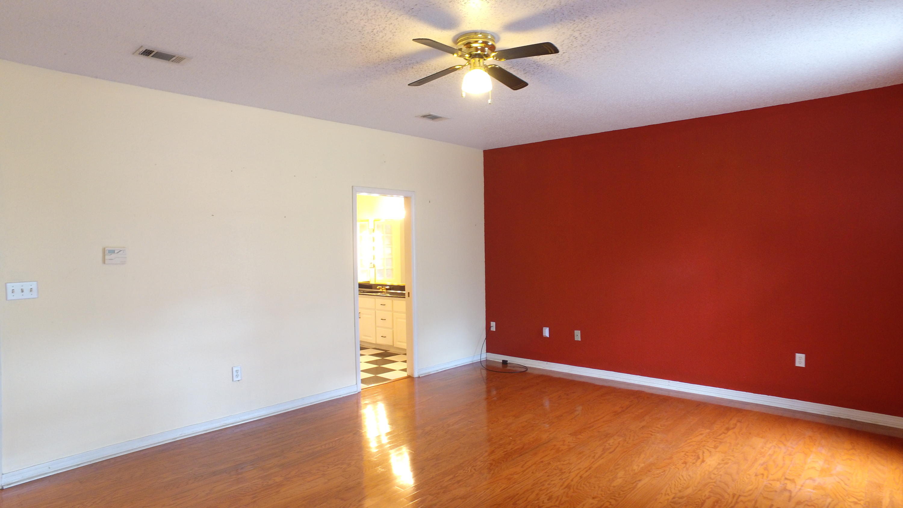 564 Ridge Lake Road Crestview, FL 32536 - Photo 45 of 58 wooden floor in an empty room
