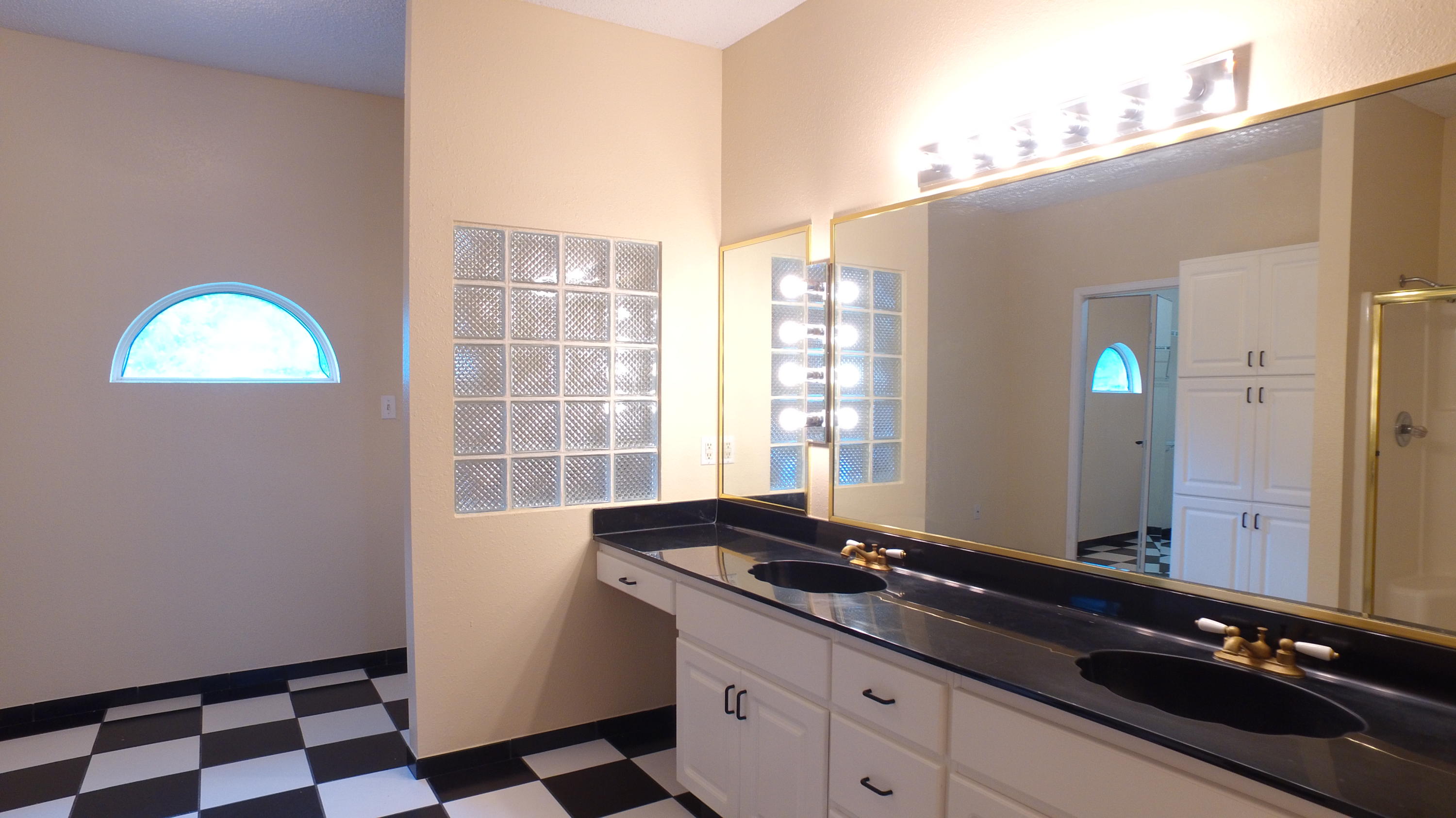 564 Ridge Lake Road Crestview, FL 32536 - Photo 46 of 58 a room with a large window and mirror