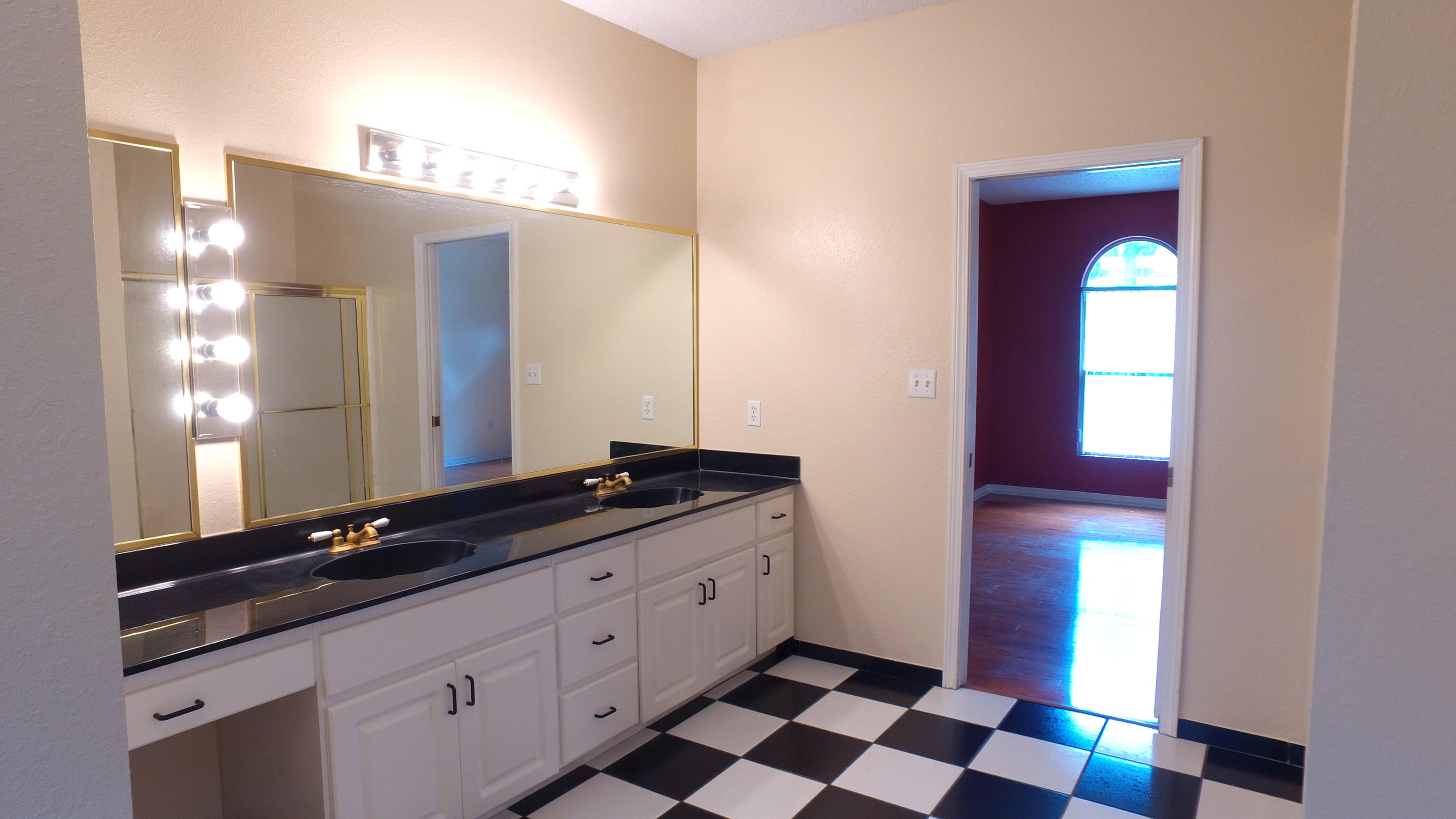 564 Ridge Lake Road Crestview, FL 32536 - Photo 47 of 58 a bathroom with a sink and a mirror