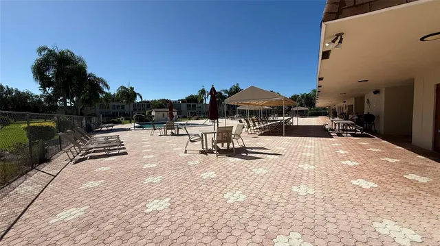 a view of outdoor space with seating area