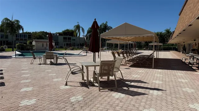 a view of swimming pool from a balcony