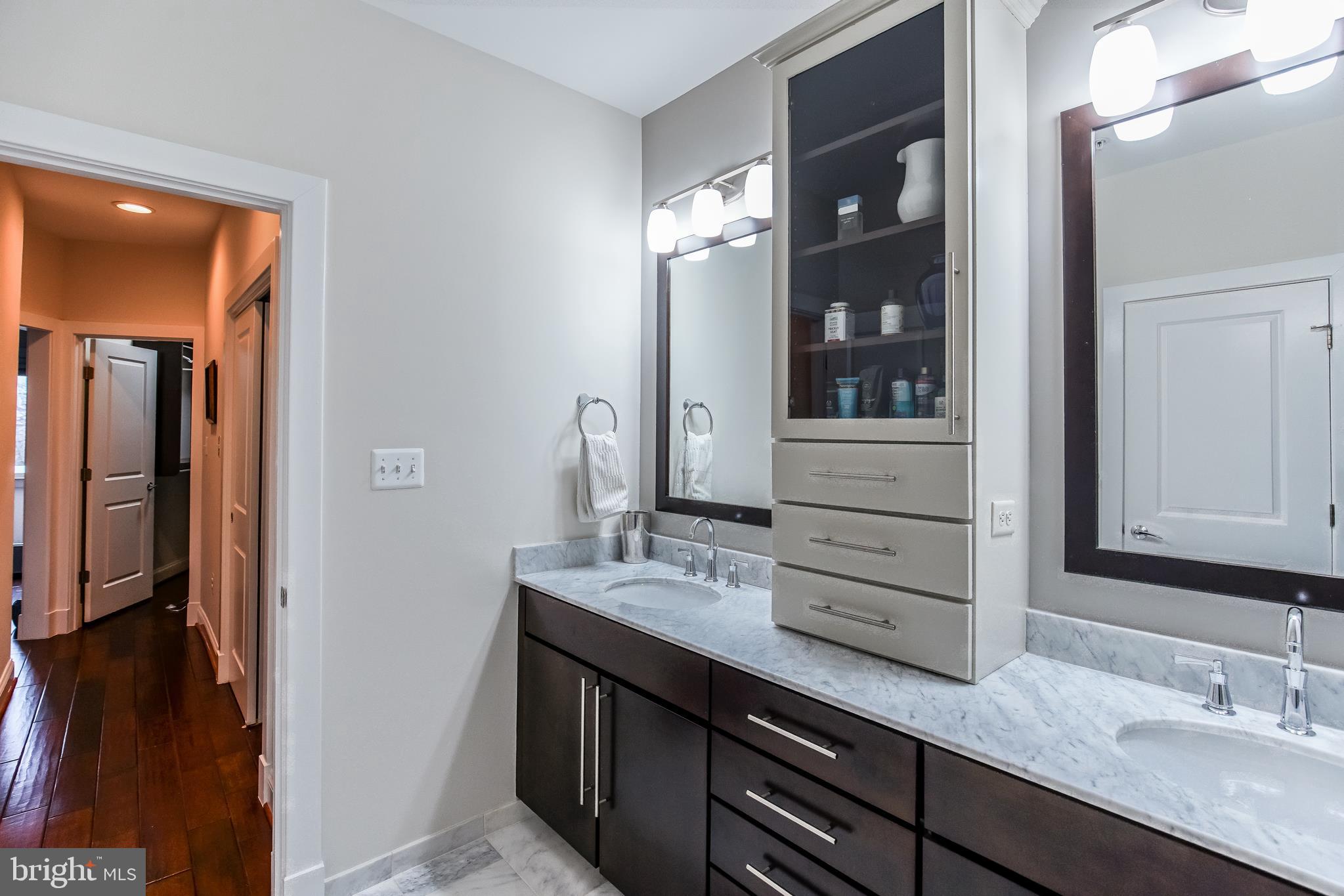 1904 Vermont Avenue Northwest, Unit B Washington, DC 20001 - Photo 15 of 26 a bathroom with a sink and a mirror