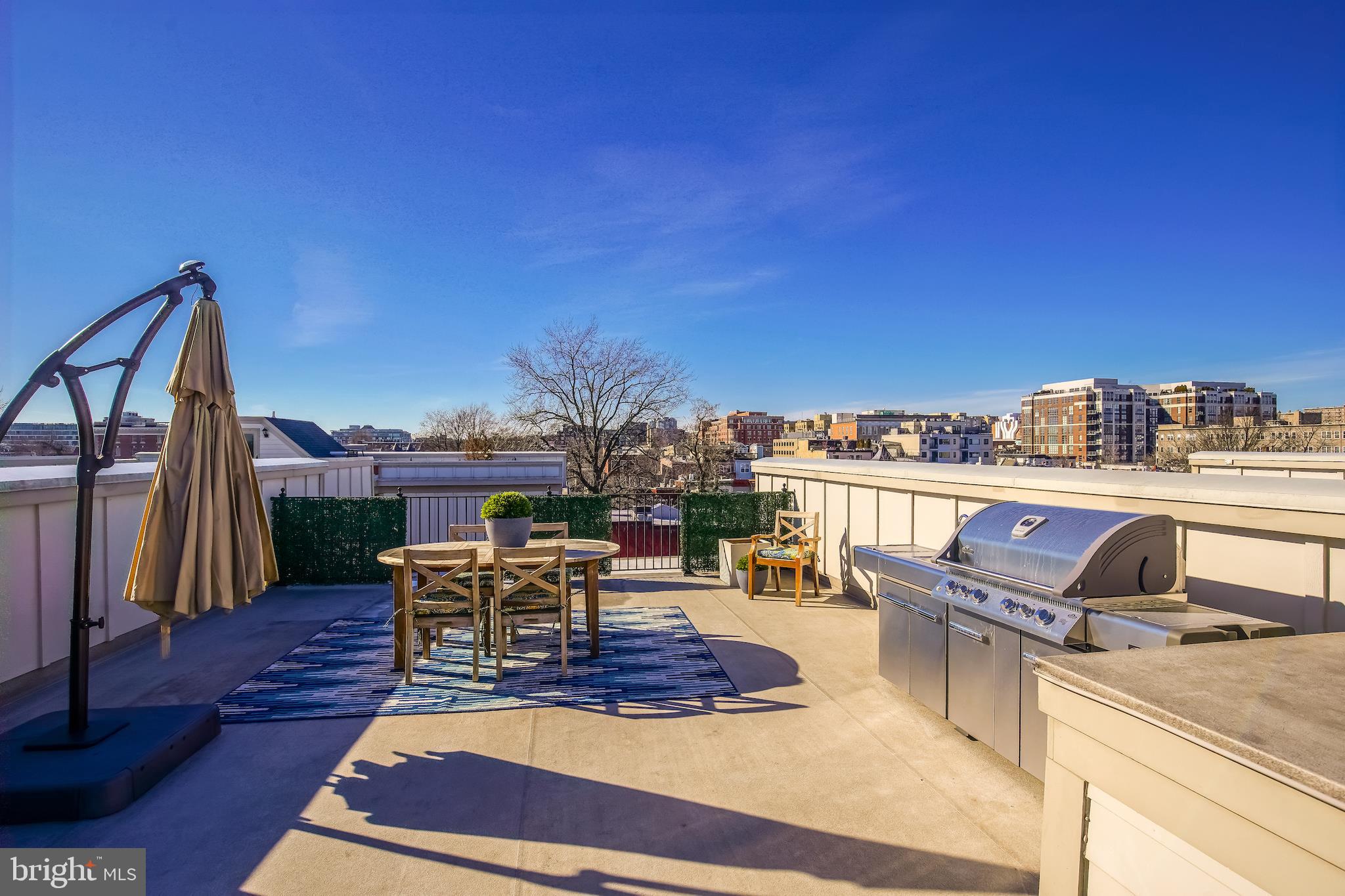 1904 Vermont Avenue Northwest, Unit B Washington, DC 20001 - Photo 21 of 26 a view of a terrace with furniture and outdoor space