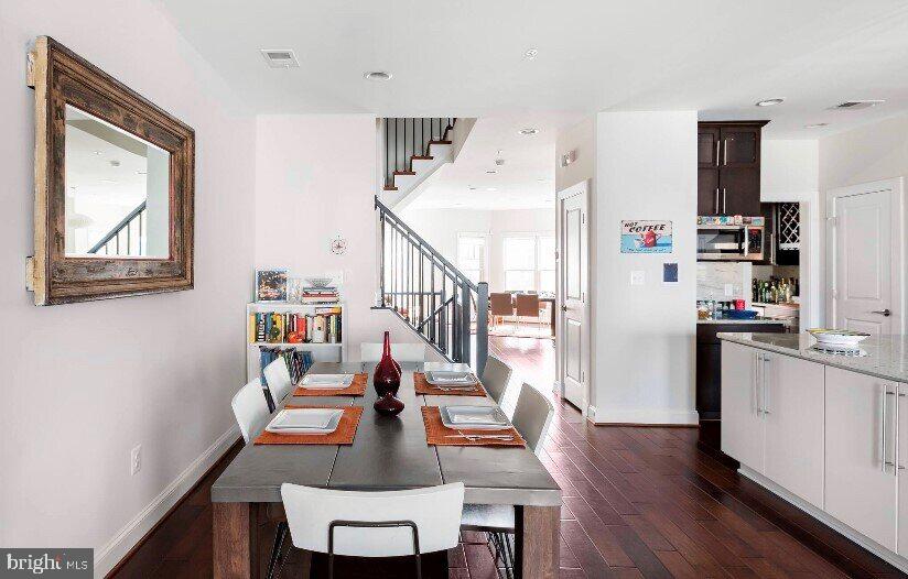1904 Vermont Avenue Northwest, Unit B Washington, DC 20001 - Photo 4 of 26 a dining room with furniture and wooden floor