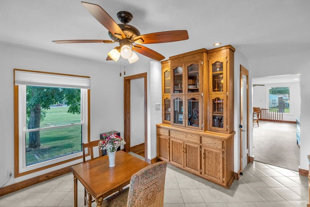 4170 North Taylor Avenue Decatur, IL 62526 - Photo 10 of 29 a dining room with furniture and a window