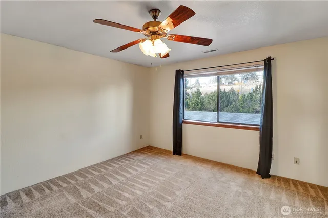 a view of an empty room with window