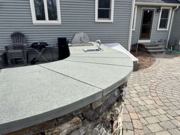 a living room with furniture and a air conditioner vent