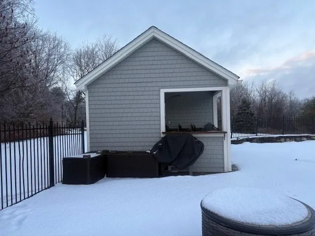 a view of backyard with furniture and trees