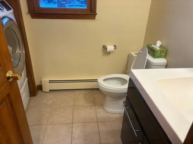 a bathroom with a sink and toilet