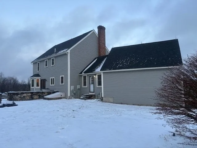 a house view with a outdoor space