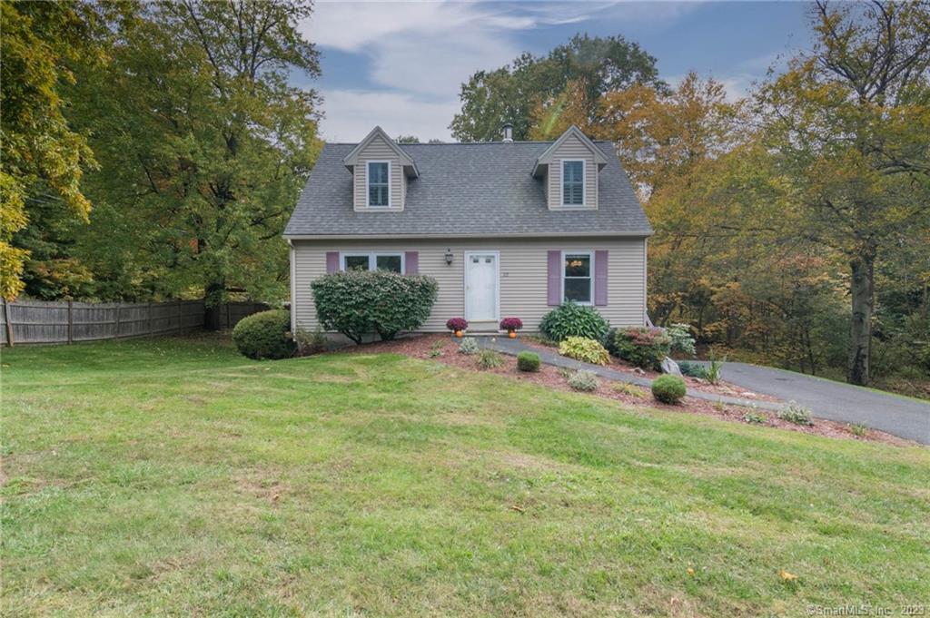 22 Pinecrest Road Enfield, CT 06082 - Photo 1 of 1 front view of house with a yard