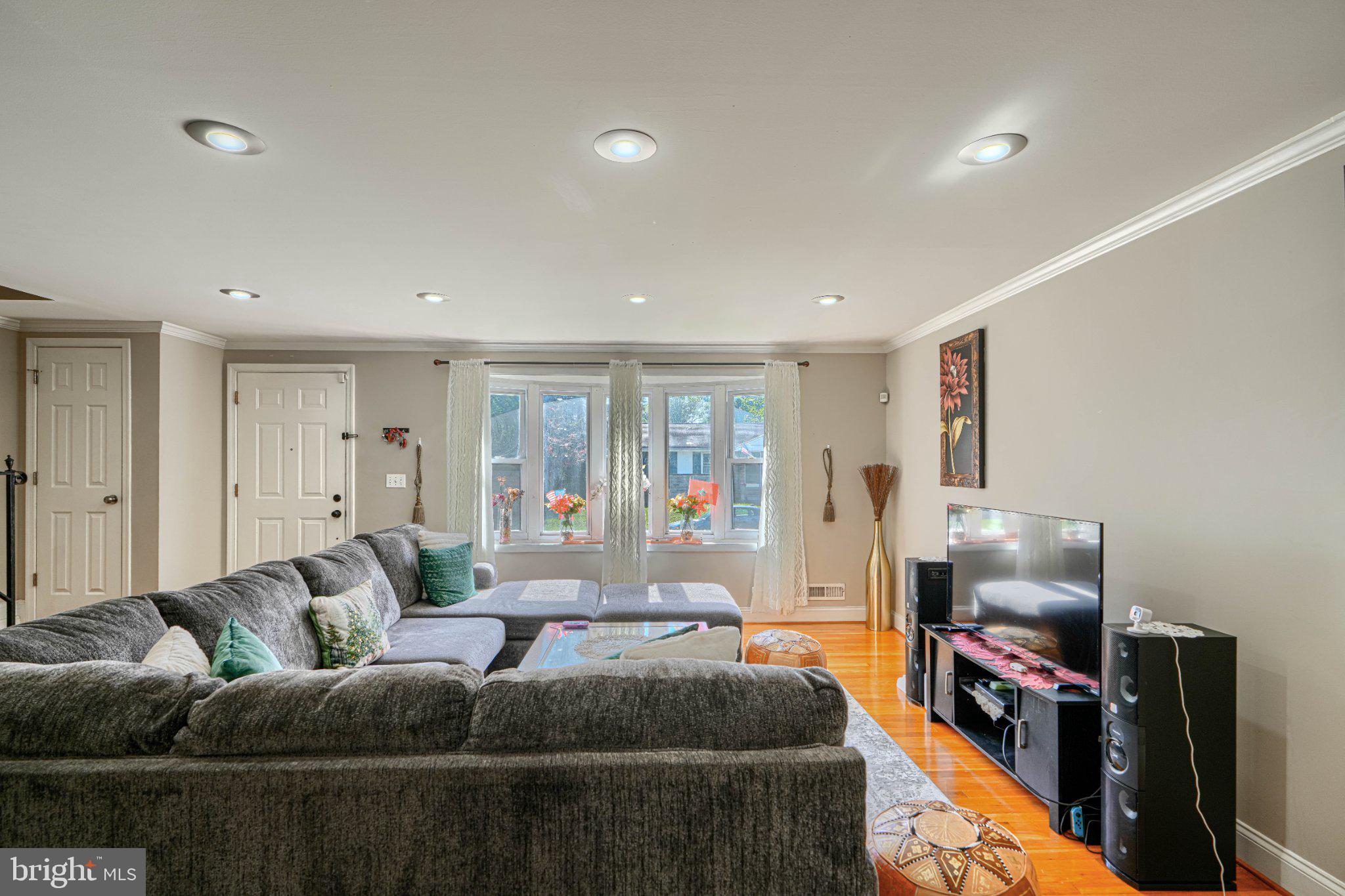 3708 Cassen Road Randallstown, MD 21133 - Photo 5 of 38 a living room with furniture and a flat screen tv