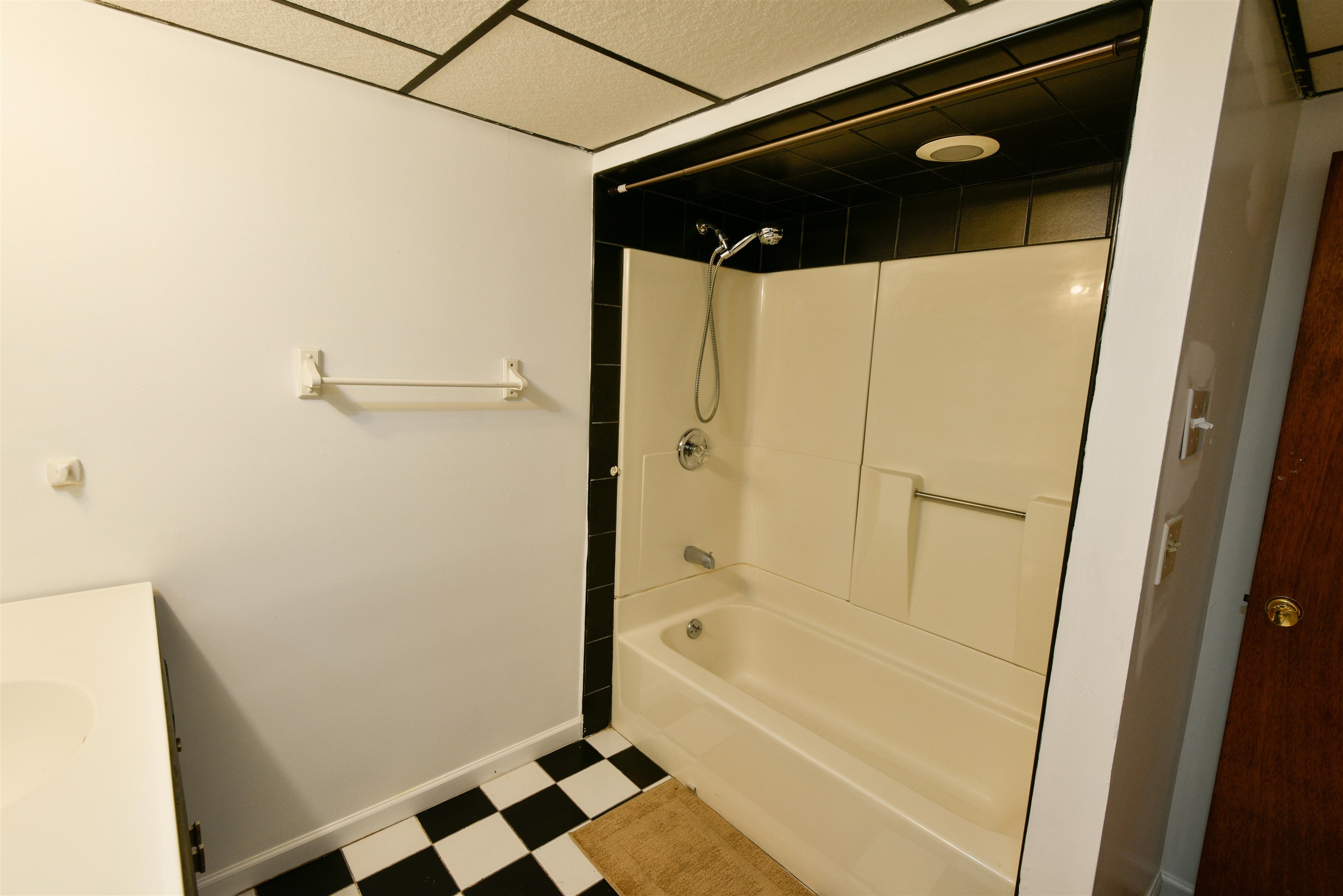 108 West 42nd Street, Unit 1 Bayonne, NJ 07002 - Photo 16 of 21 a bathroom with a bathtub and shower