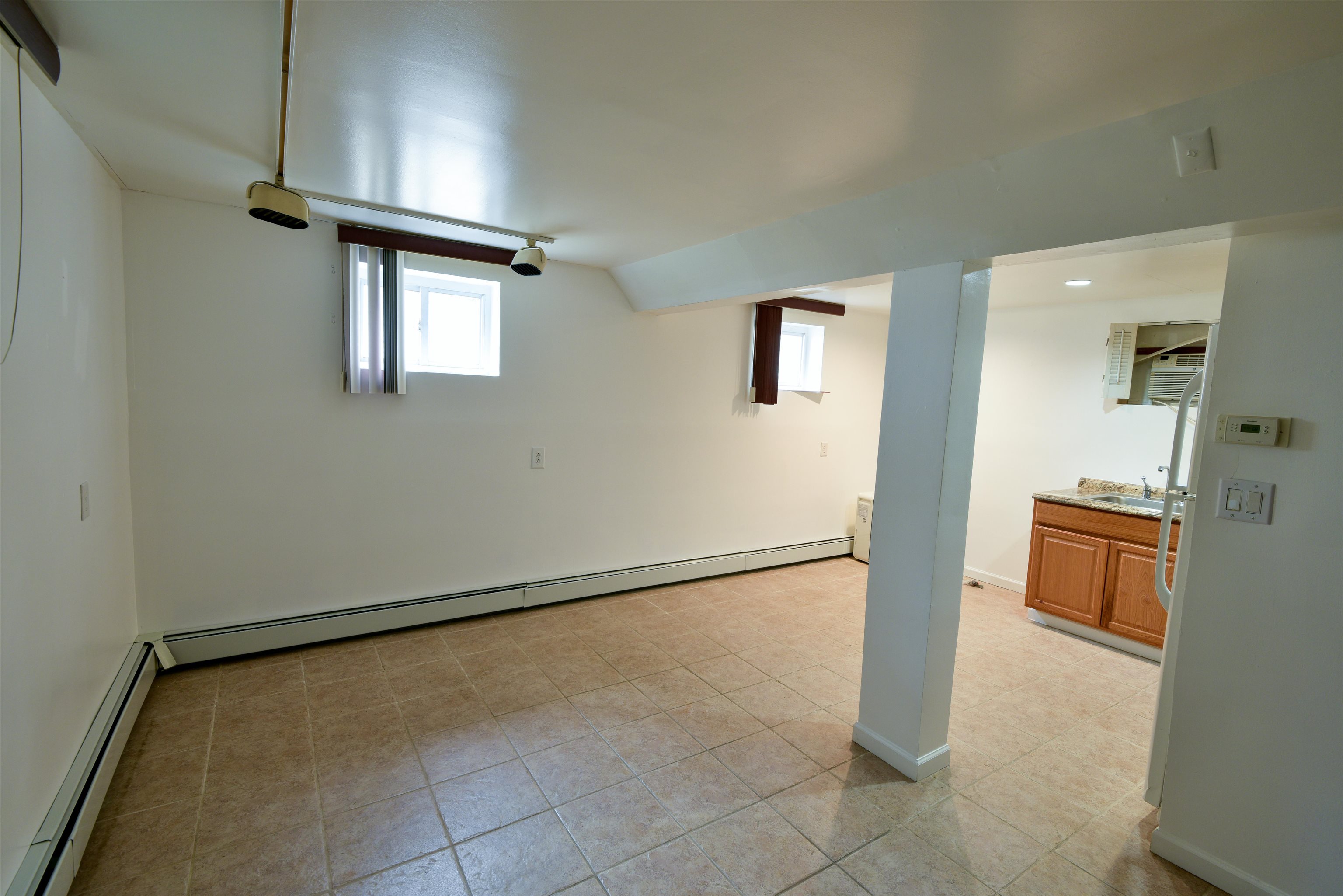 108 West 42nd Street, Unit 1 Bayonne, NJ 07002 - Photo 20 of 21 a view of an empty room