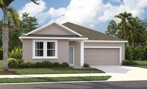 5766 Cattle Rnch Drive St. Cloud, FL 34771 - Photo 1 of 1 a front view of a house with a yard and garage