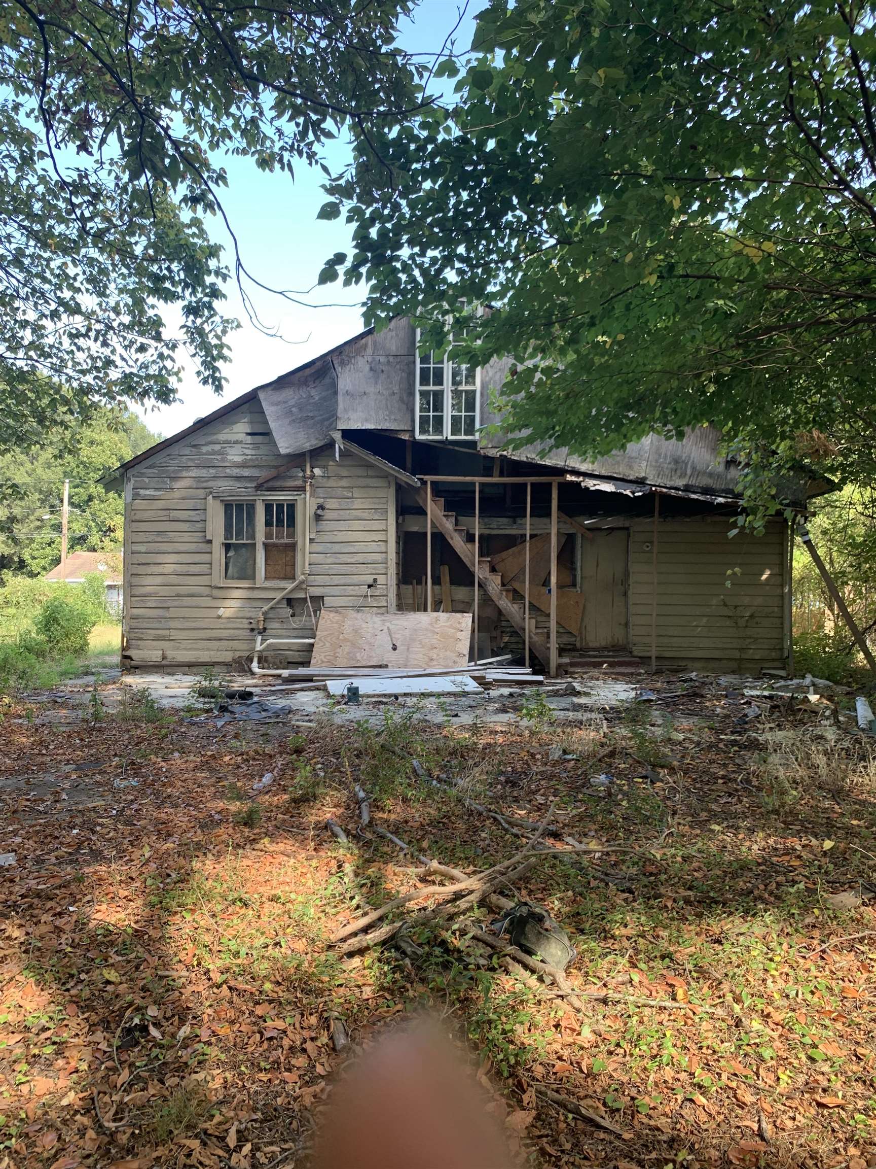 3043 Sax Road Memphis, TN 38109 - Photo 5 of 6 a backyard of a house with yard and barbeque oven