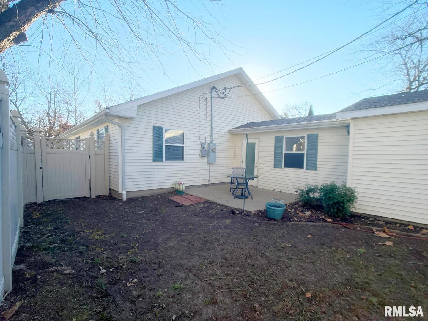 617 North 10th Street Herrin, IL 62948 - Photo 16 of 22 a view of a house with backyard