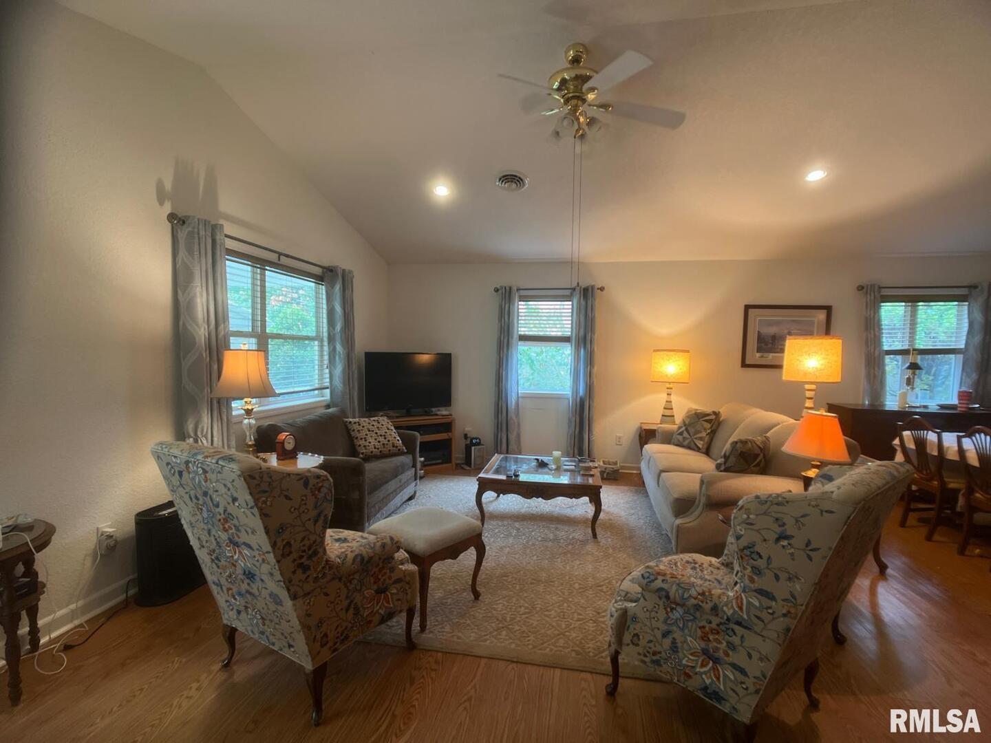617 North 10th Street Herrin, IL 62948 - Photo 3 of 22 a living room with furniture and a flat screen tv