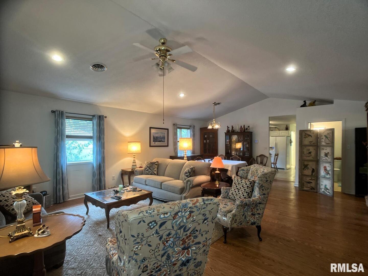 617 North 10th Street Herrin, IL 62948 - Photo 4 of 22 a living room with furniture and wooden floor