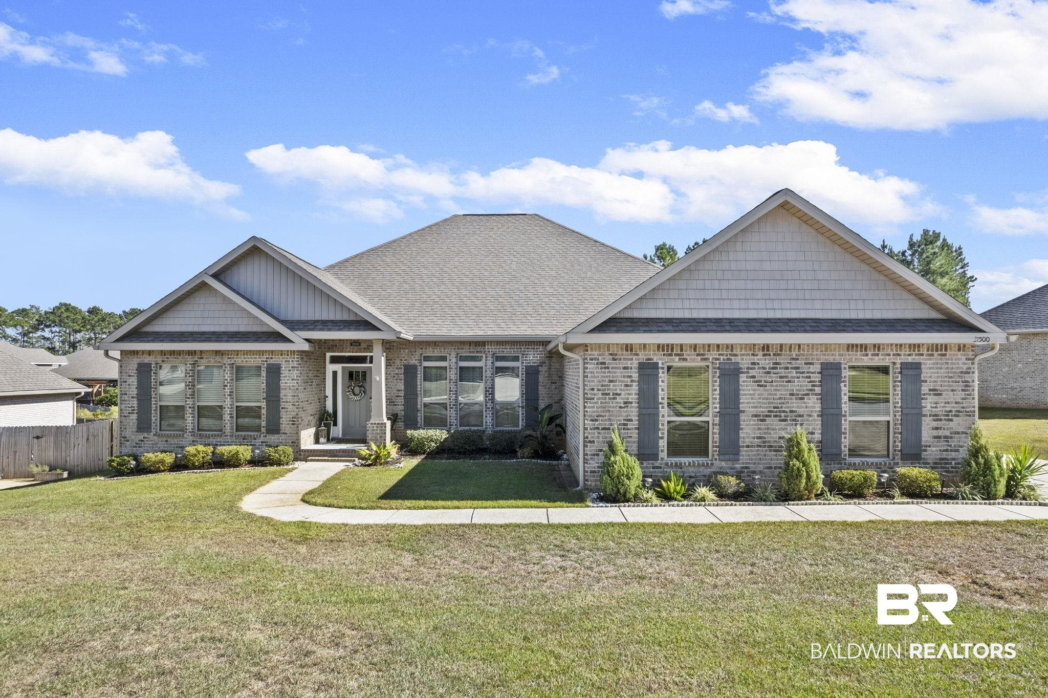 31500 Spoonbill Road Daphne, AL 36527 - Photo 60 of 85 Craftsman-style house with a front lawn