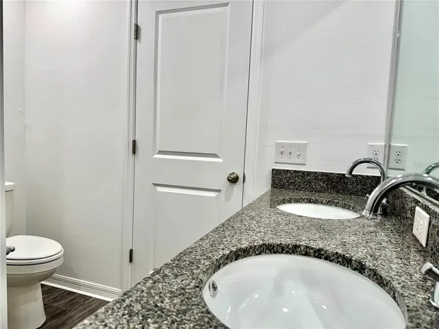 a bathroom with a sink and a toilet