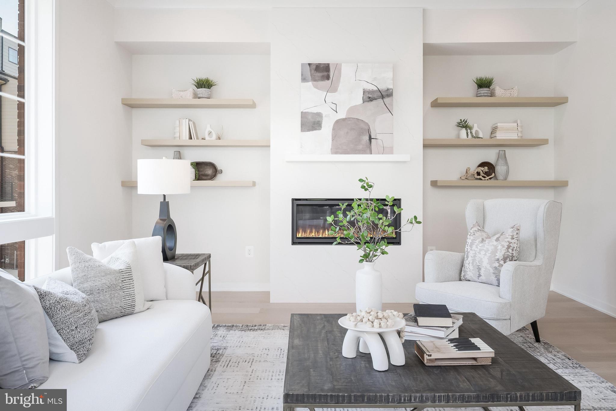 11748 Sunrise Valley Drive Reston, VA 20191 - Photo 15 of 60 a living room with furniture and a wooden floor