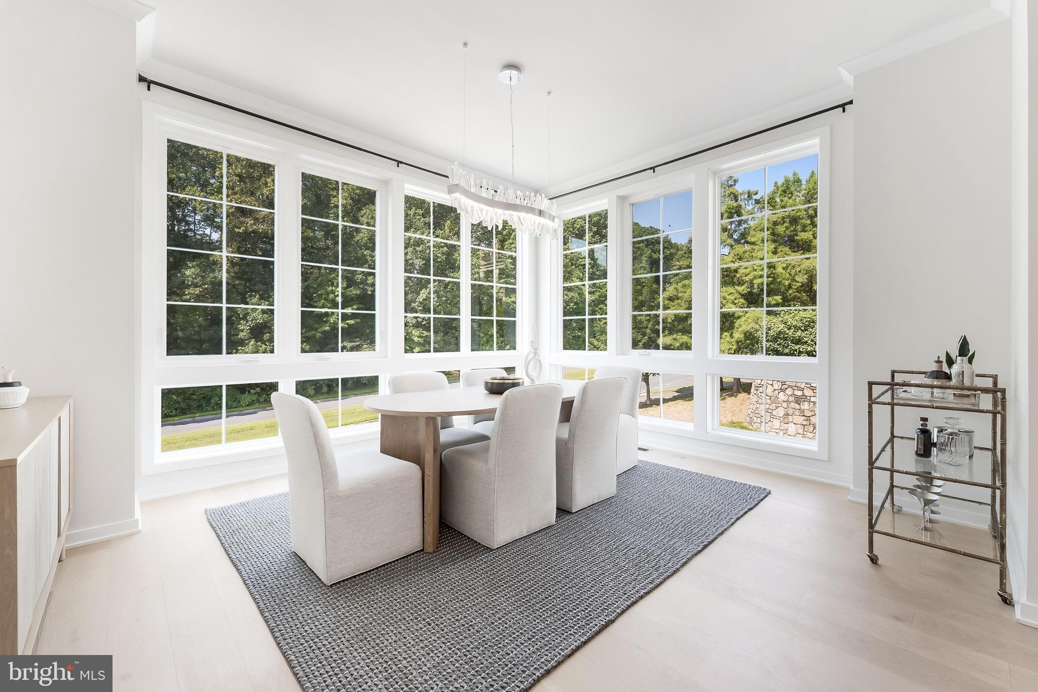 11748 Sunrise Valley Drive Reston, VA 20191 - Photo 25 of 60 a living room with furniture and a large window