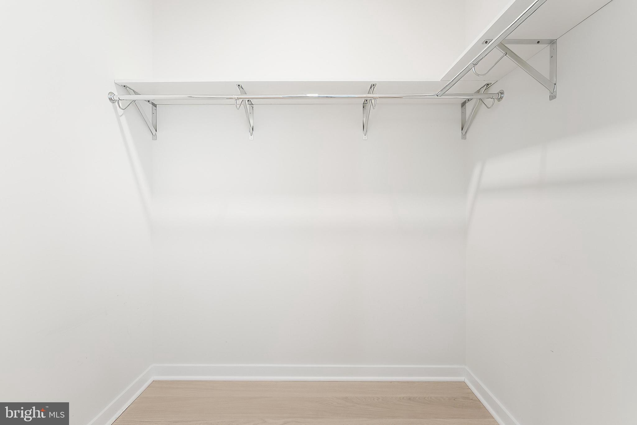 11748 Sunrise Valley Drive Reston, VA 20191 - Photo 40 of 60 a view of a room with racks on the wall