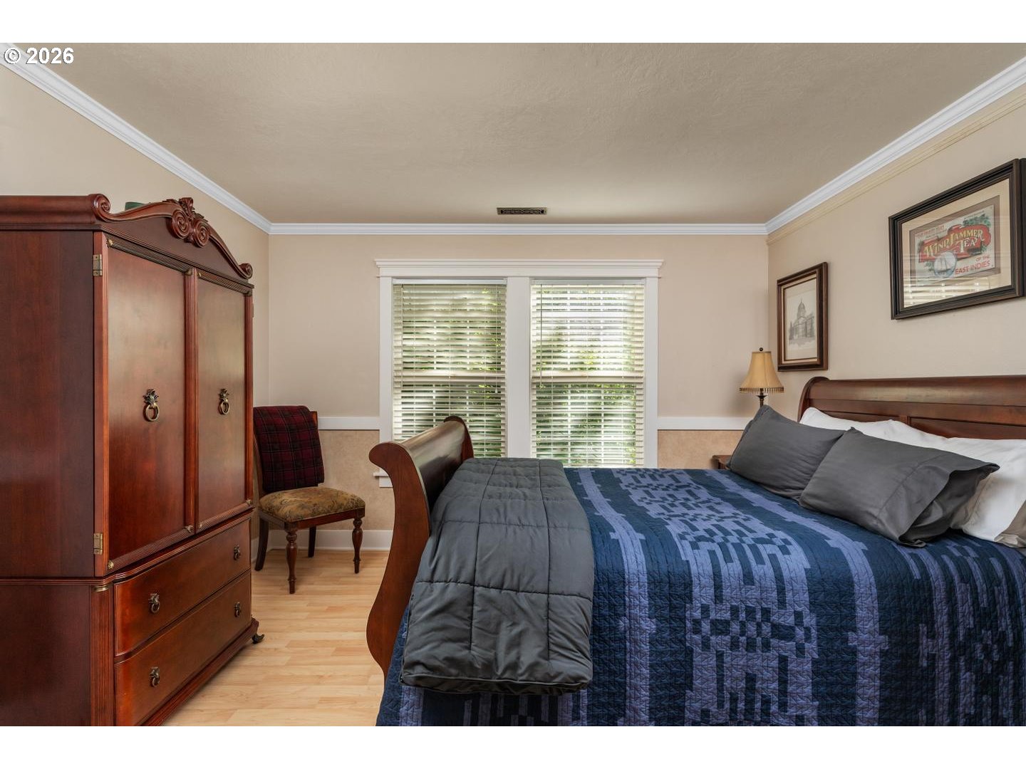16042 Southwest Waxwing Way Beaverton, OR 97007 - Photo 30 of 48 a bedroom with a bed mirror and window