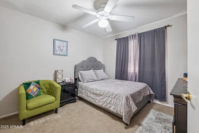 a view of a house with a yard porch and sitting area