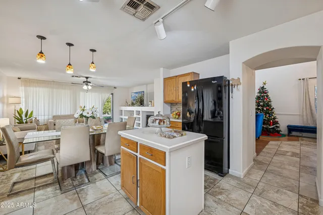 a kitchen with a stove a sink and a microwave