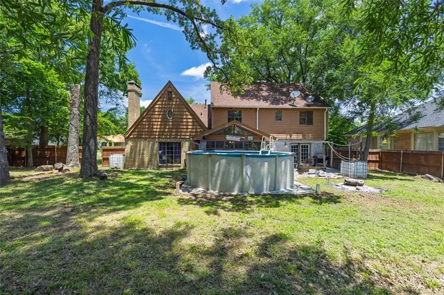 a house view with a garden space